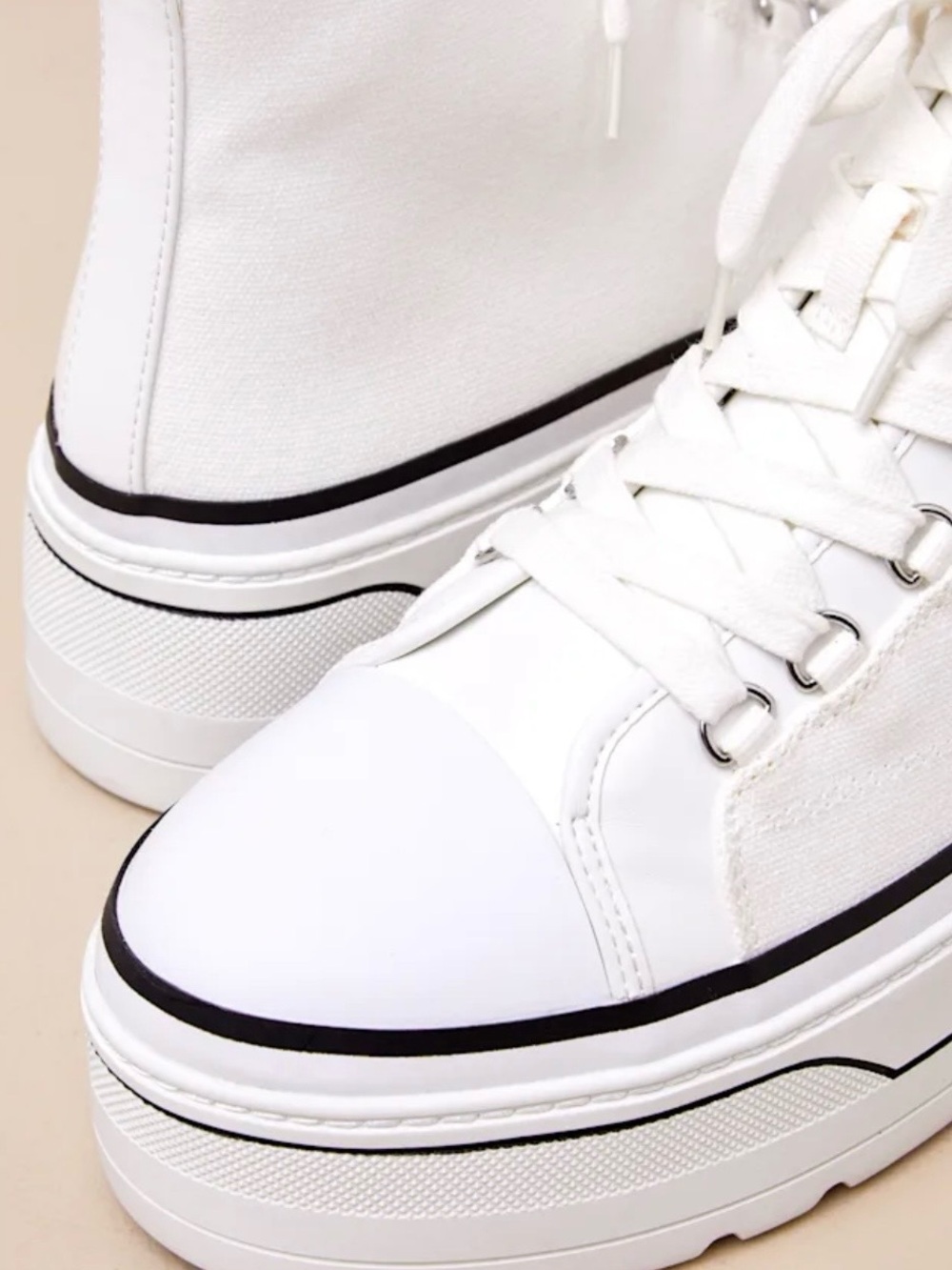 D'Amelio Footwear Eyekonn platform sneakers white canvas with silver lace hooks.